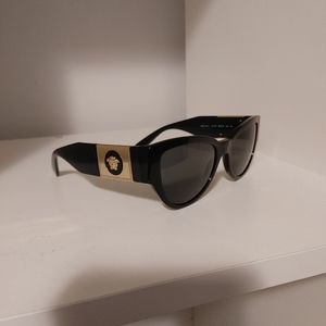 Women's Versace polarized sunglasses.